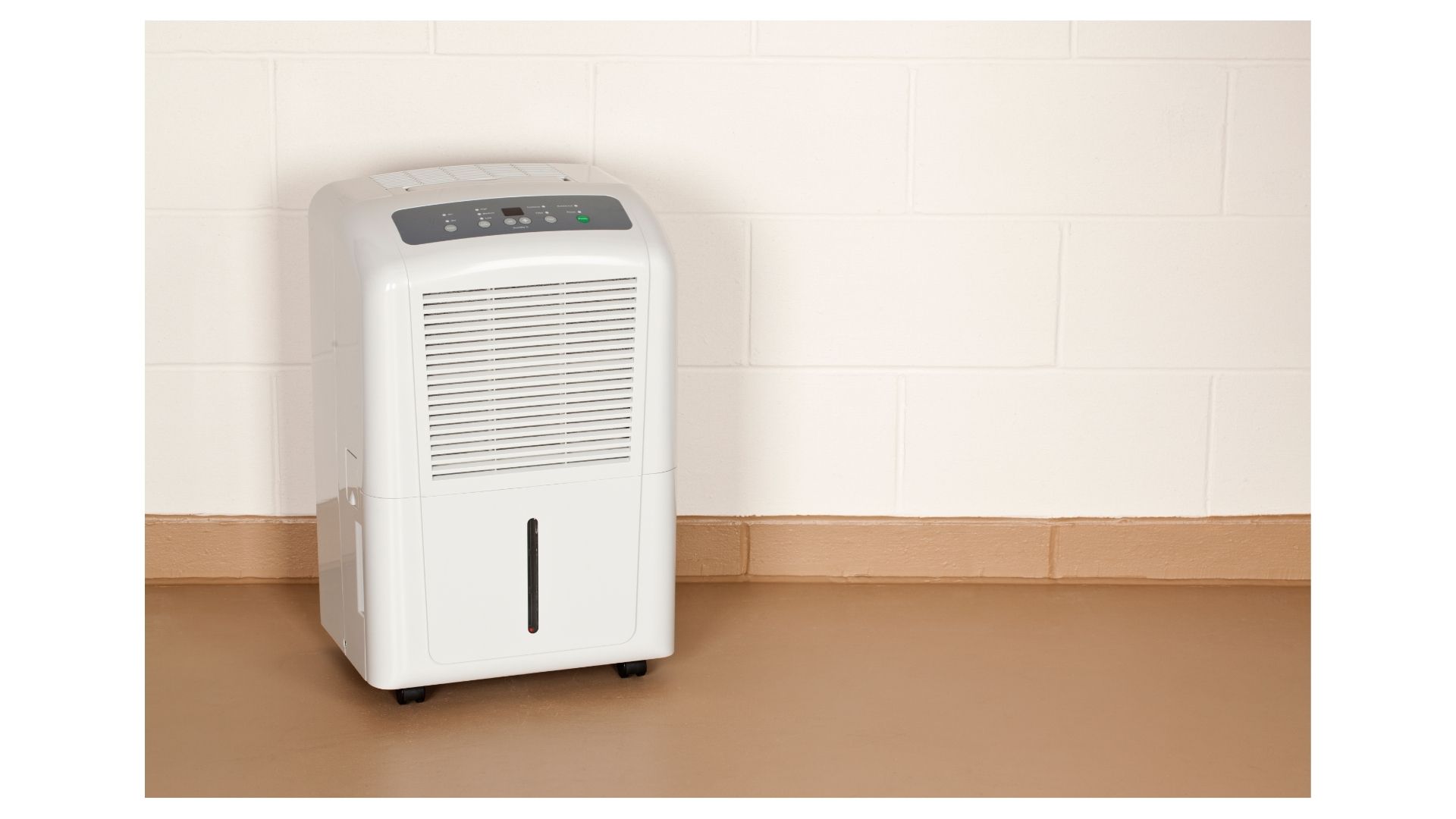 Whole home dehumidifier Branson MO - Now! Heating & Cooling technician installing dehumidifier in Ozarks home basement
