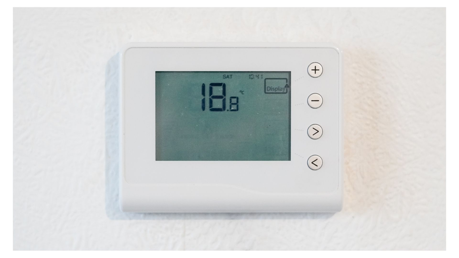 smart thermostat Branson MO - Now! Heating & Cooling technician installing Wi-Fi thermostat in home