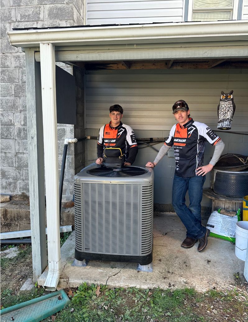 HVAC maintenance plan Branson MO - Now! Heating & Cooling technician performing seasonal system check